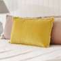 Coussin velours franges Fara